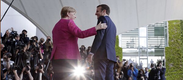Angela Merkel, canciller de Alemania, y Emmanuel Macron, presidente de Francia - Sputnik Mundo