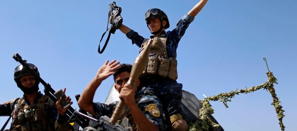 Militares iraquíes durante la liberación de Mosul, Irak - Sputnik Mundo