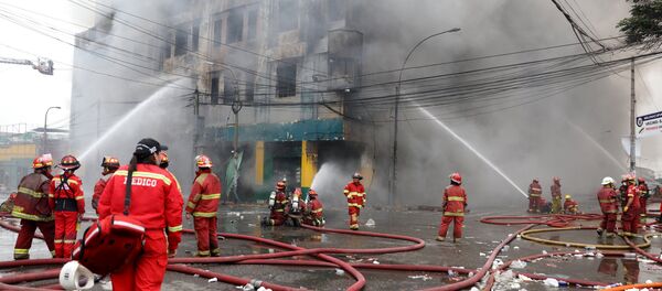 El incendio en 'Galeria Nicolini', Perú - Sputnik Mundo