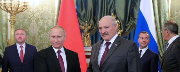 Presidente de Rusia, Vladímir Putin, presidente de Bielorrusia, Alexandr Lukashenko - Sputnik Mundo