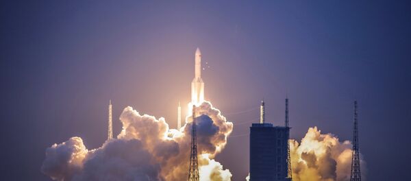 Lanzamiento del cohete pesado chino Larga Marcha 5 - Sputnik Mundo