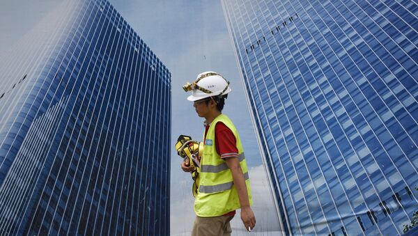 Trabajador chino en Pekín, China - Sputnik Mundo