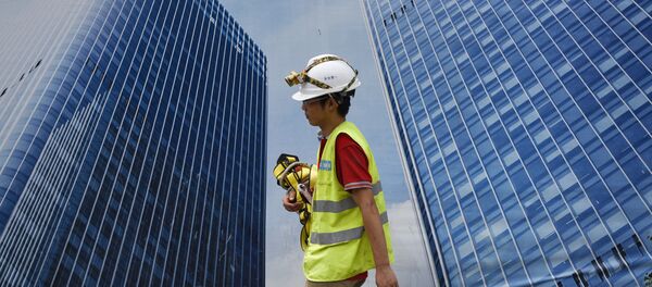 Trabajador chino en Pekín, China - Sputnik Mundo