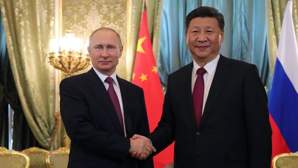 El presidente ruso, Vladímir Putin con su homólogo chino, Xi Jinping El presidente ruso, Vladímir Putin con su homólogo chino, Xi Jinping - Sputnik Mundo