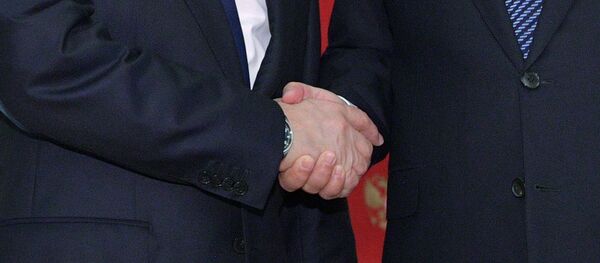 El presidente de Rusia, Vladímir Putin con su homólogo chino, Xi Jinping - Sputnik Mundo