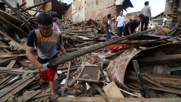 Consecuencias de las inundaciones en China Consecuencias de las inundaciones en China - Sputnik Mundo