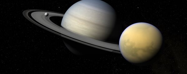 Saturno y sus satélites Titán y Encélado - Sputnik Mundo