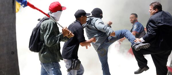Enfrentamientos en Caracas - Sputnik Mundo