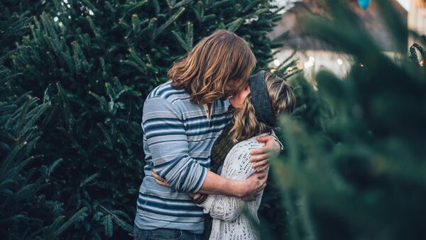 Un beso - Sputnik Mundo
