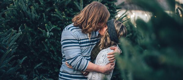 Un beso - Sputnik Mundo