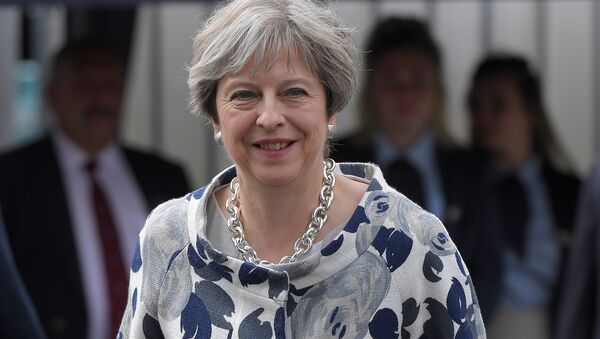 Theresa May, primera ministra de el Reino Unido - Sputnik Mundo