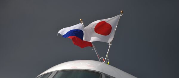 Las banderas de Rusia y Japón - Sputnik Mundo