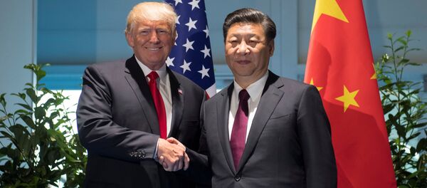 El presidente estadounidense, Donald Trump, y el presidente de China, Xi Jinping - Sputnik Mundo