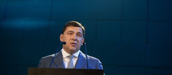 El gobernador de la región rusa de Sverdlovsk Evgueni Kuivashev en la exposición internacional Innoprom 2016 - Sputnik Mundo