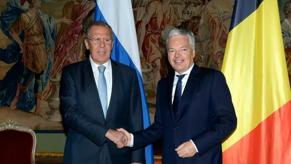 Serguéi Lavrov, ministro de Exteriores de Rusia, y su homólogo belga, Didier Reynders