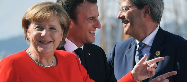 La canciller alemana, Angela Merkel, el presidente de Francia, Emmanuel Macron y el primer ministro italiano Paolo Gentiloni - Sputnik Mundo