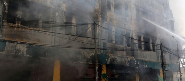 Edificio de galería Nicolini en Perú después de incendio Edificio de galería Nicolini en Perú después de incendio - Sputnik Mundo