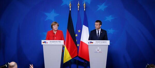 La canciller alemana, Angela Merkel, el presidente de Francia, Emmanuel Macron - Sputnik Mundo