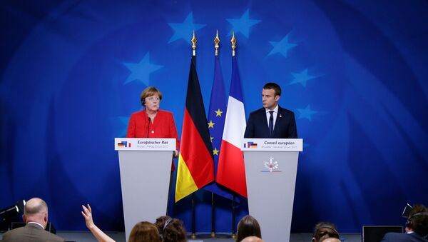 La canciller alemana, Angela Merkel, el presidente de Francia, Emmanuel Macron - Sputnik Mundo