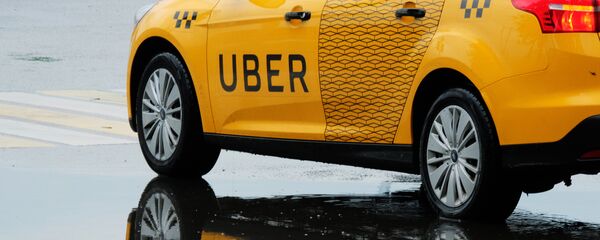 Un taxi de Uber - Sputnik Mundo