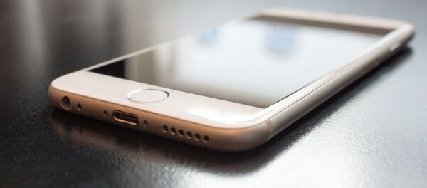 Un iPhone - Sputnik Mundo