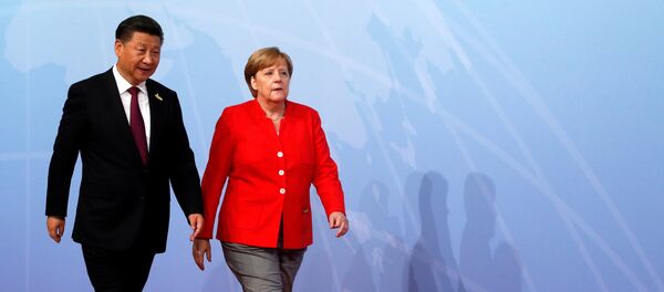 Presidente de China, Xi Jinping, la canciller de Alemania, Angela Merkel - Sputnik Mundo