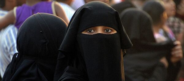 Una mujer musulmana - Sputnik Mundo