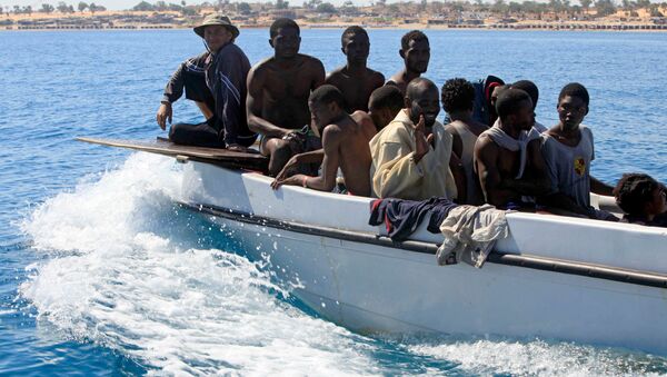 Migrantes libios (archivo) - Sputnik Mundo
