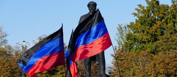 Las banderas de la RPD (archivo) - Sputnik Mundo