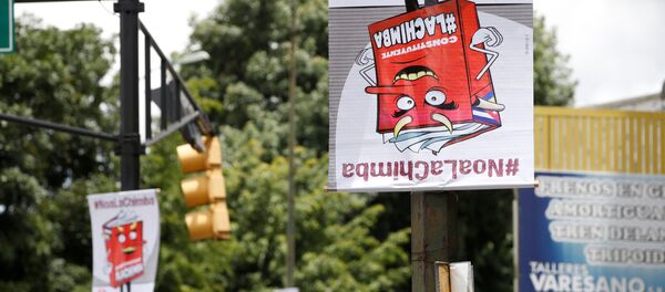 Pancartas contra la Constituyente en una calle de Caracas - Sputnik Mundo