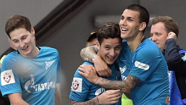 De izquierda a derecha: los jugadores del Zenit de San Petersburgo Daler Kuzyaev, Sebastian Driussi y Leandro Paredes festejan un gol contra el Rubin de Kazán por la Liga Premier de Rusia. - Sputnik Mundo