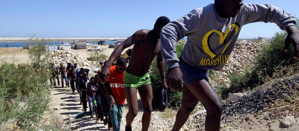 Los migrantes libios (archivo) Los migrantes libios (archivo) - Sputnik Mundo