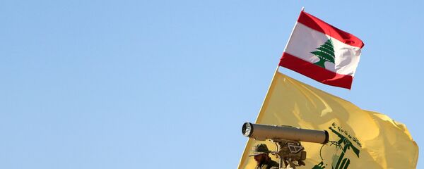 Un miembro del Hizbulá en la frontera siria-libanesa - Sputnik Mundo