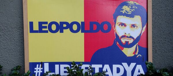 Un cartel con el retrato de Leopoldo López - Sputnik Mundo