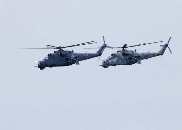 Dos helicópteros Mi-24VM Dos helicópteros Mi-24VM - Sputnik Mundo
