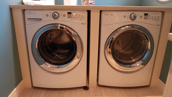 Una lavadora - Sputnik Mundo