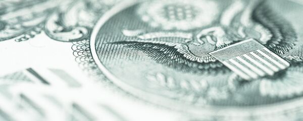 Un dólar (imagen referencial) Un dólar (imagen referencial) - Sputnik Mundo