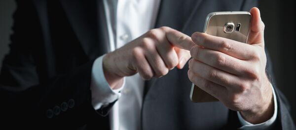 Teléfono inteligente (imagen referencial) - Sputnik Mundo