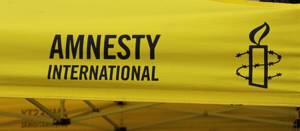 Logo de Amnistía Internacional - Sputnik Mundo