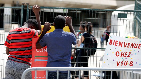 Refugiados en Canadá - Sputnik Mundo