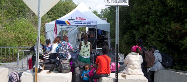 Refugiados en Canadá - Sputnik Mundo