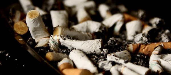 Un cigarrillo - Sputnik Mundo