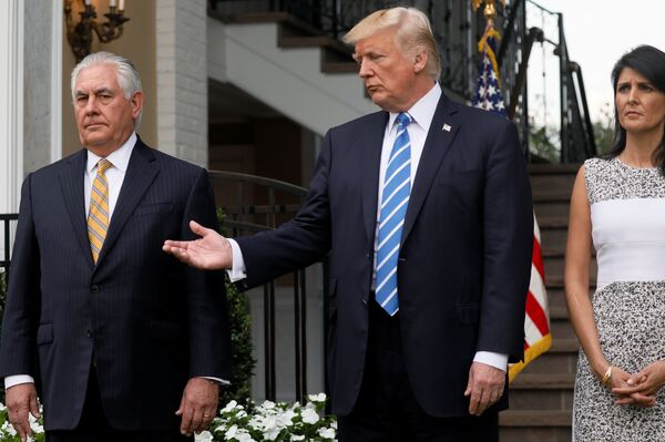 El presidente estadounidense, Donald Trump, y su ministro de Exteriores, Rex Tillerson El presidente estadounidense, Donald Trump, y su ministro de Exteriores, Rex Tillerson - Sputnik Mundo