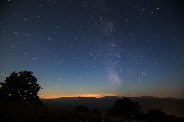 Las impresionantes perseidas, la principal lluvia de estrellas del año (fotos) Las impresionantes perseidas, la principal lluvia de estrellas del año (fotos) - Sputnik Mundo