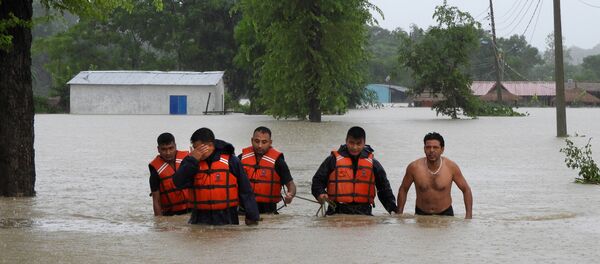 Un grupo de rescatistas en Nepal Un grupo de rescatistas en Nepal - Sputnik Mundo