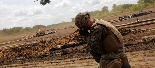 Un soldado estadounidense, durante las maniobras en Hokkaido Un soldado estadounidense, durante las maniobras en Hokkaido - Sputnik Mundo