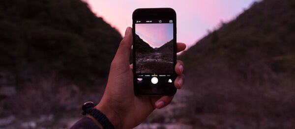 Un iPhone (imagen referencial) - Sputnik Mundo