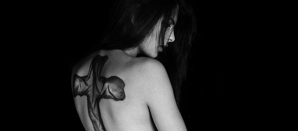 Una mujer - Sputnik Mundo