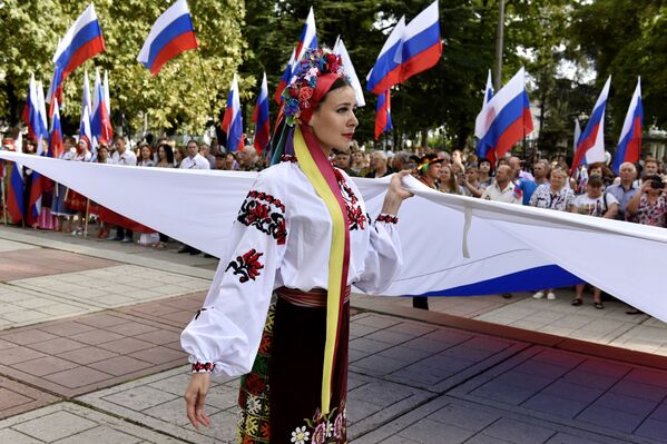 Rusia celebra a lo grande el Día de la Bandera Nacional Rusia celebra a lo grande el Día de la Bandera Nacional - Sputnik Mundo