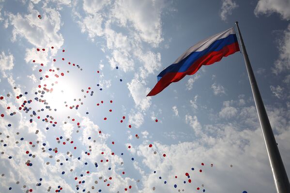 Rusia celebra a lo grande el Día de la Bandera Nacional Rusia celebra a lo grande el Día de la Bandera Nacional - Sputnik Mundo